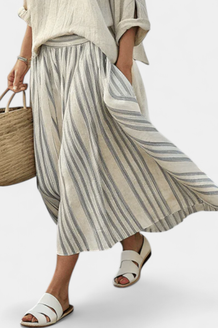 Elegant and Comfortable Complete Casual Daisy Set: Oversized Blouse with Striped Midi Skirt