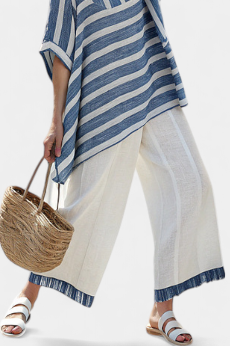 Chic Mediterranean Set with Blue Stripes and Hem-Finished Trousers for a Fresh, Stylish Look