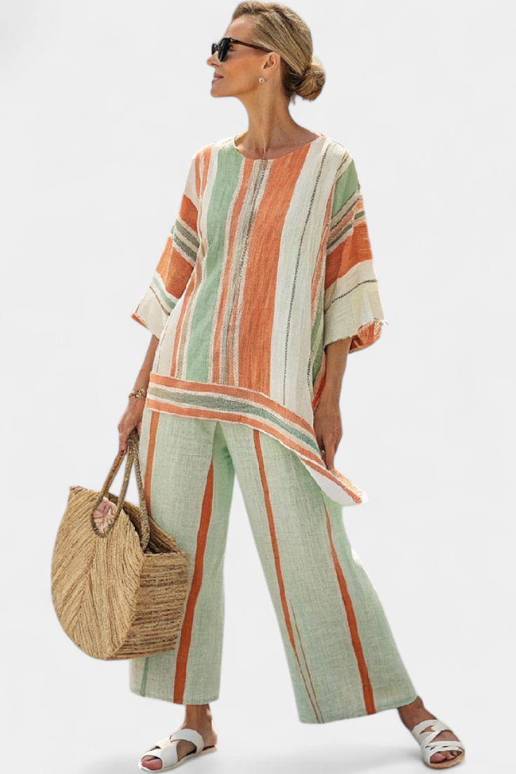 Chic Striped Ensemble Featuring Asymmetrical Blouse and Wide-Leg Pants for a Sophisticated Look