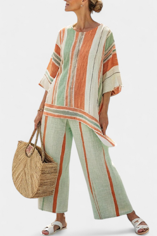 Chic Striped Ensemble Featuring Asymmetrical Blouse and Wide-Leg Pants for a Sophisticated Look