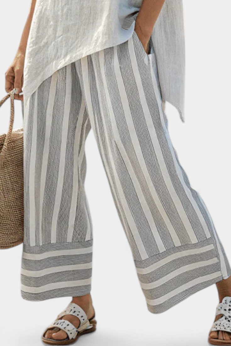 Daisy Asymmetrical Blouse and Striped Pants Set for a Chic and Contemporary Look