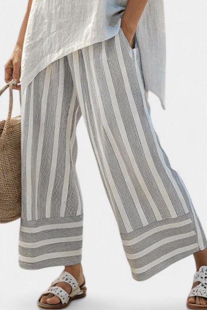 Daisy Asymmetrical Blouse and Striped Pants Set for a Chic and Contemporary Look
